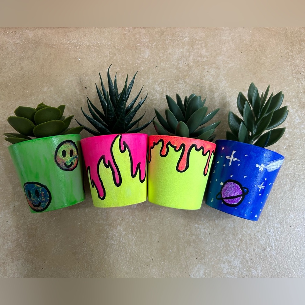 Fake plants with painted vases.
